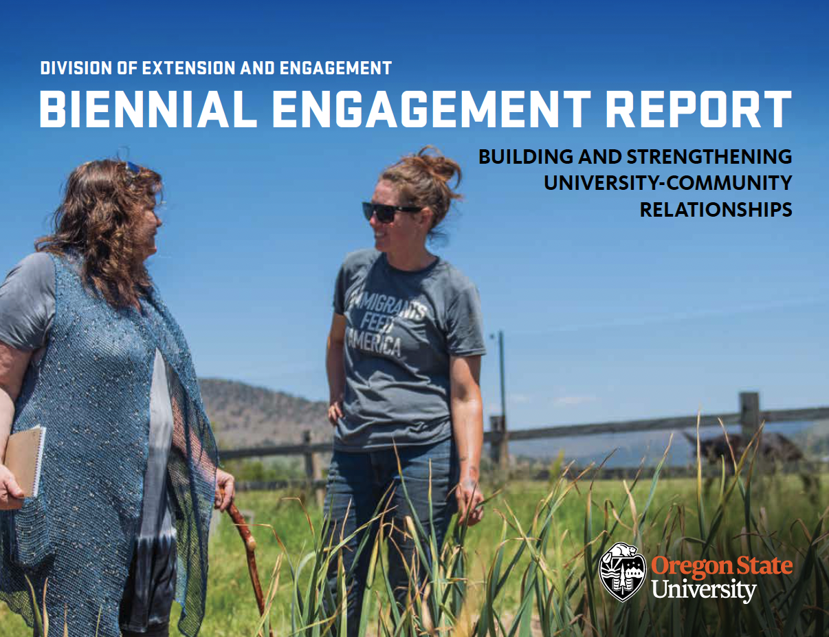 Division of Extension and Engagement Biennial Engagement Report Building and Strengthening University-Community Relationships - photo of two women talking in a field