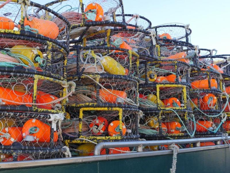 crab pots stacked on ship